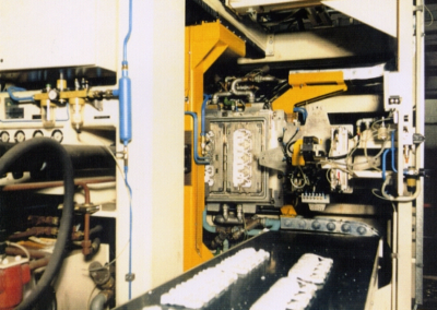 Integrated molding machine in operation at a foundry.